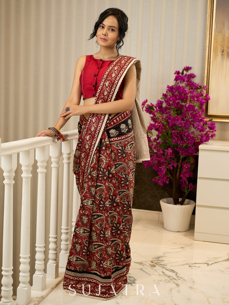 Maroon magic in bold paisley hand block prints on cotton saree