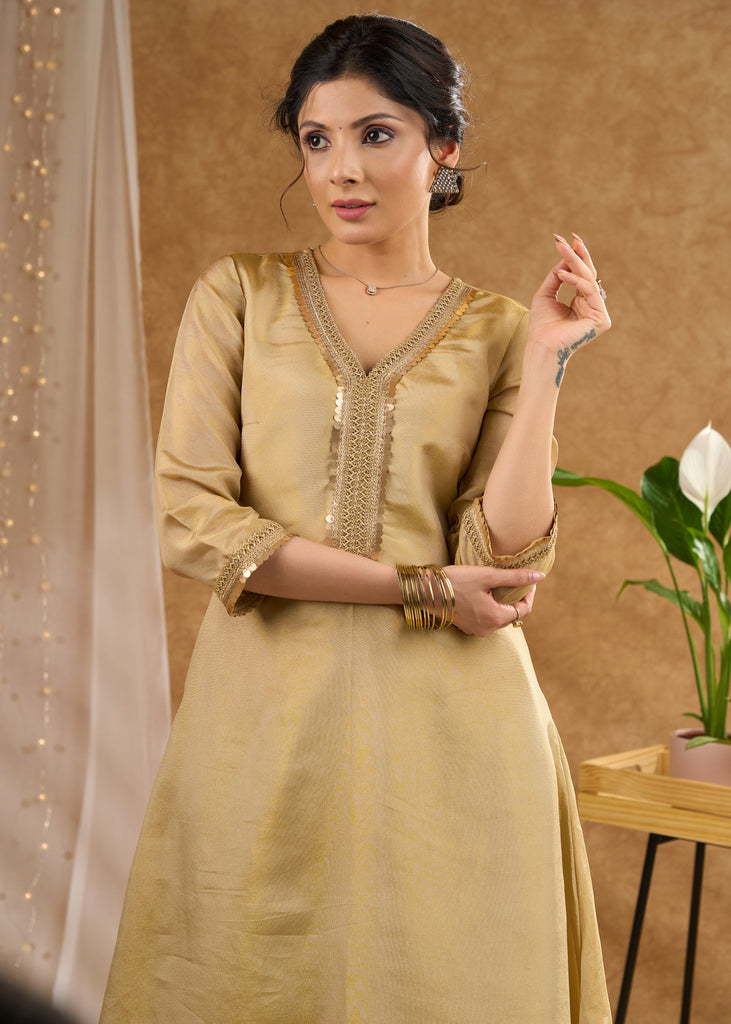 Subtle golden tissue A line kurta with tissue pant Dupatta optional