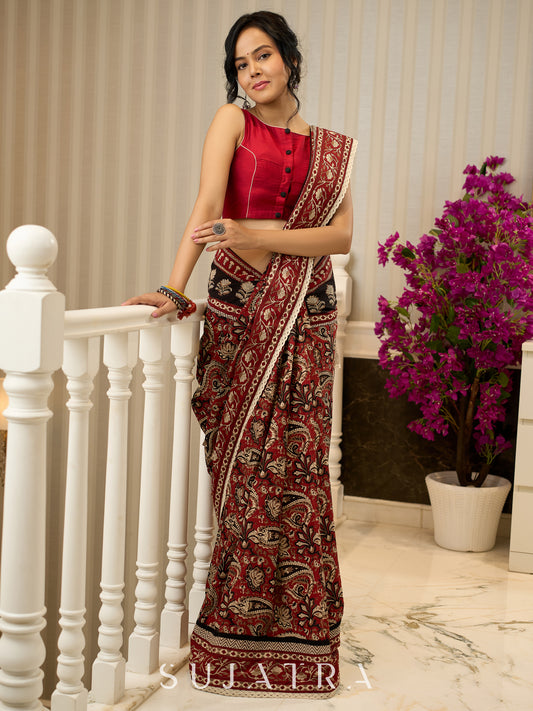 Maroon magic in bold paisley hand block prints on cotton saree