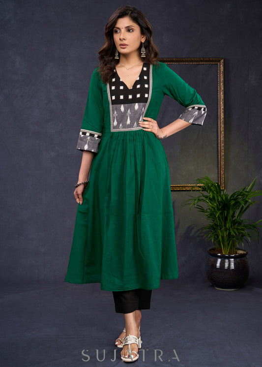 Elegant-Bottle-Green-Cotton-A-Line-Kurta-Highlighted-With-Ikat-Combination--Pant-Optional