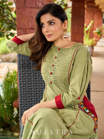 Beautiful Pista green cotton kurta featuring mirror-highlighted functional side pocket -pant optional
