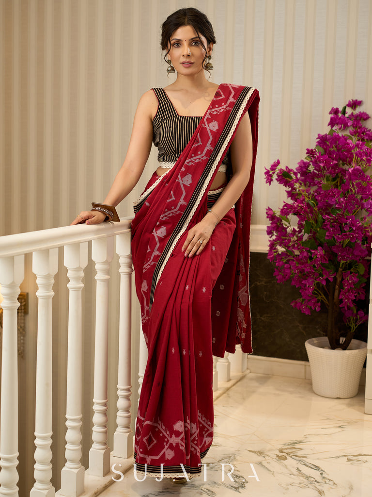 Exquisite Jamdani saree in regal red with intricate motifs and lace borders