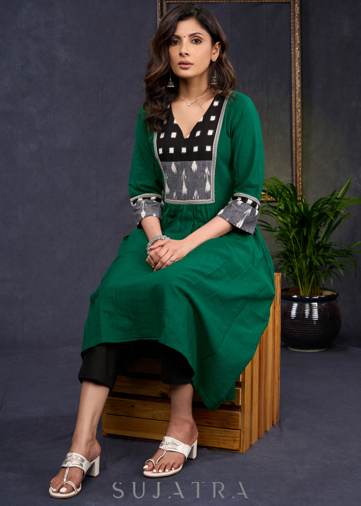 Elegant-Bottle-Green-Cotton-A-Line-Kurta-Highlighted-With-Ikat-Combination--Pant-Optional