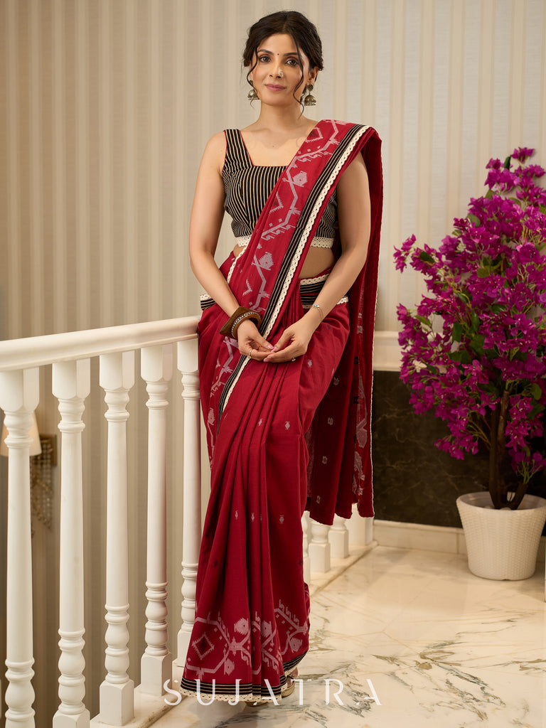 Exquisite Jamdani saree in regal red with intricate motifs and lace borders