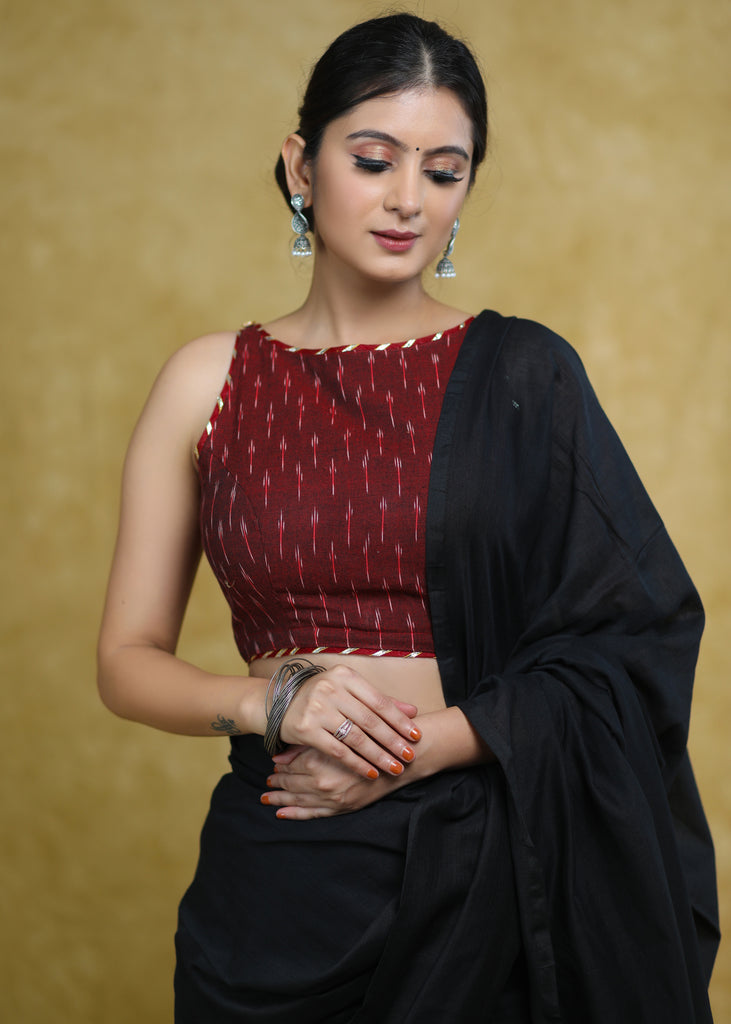 Elegant Maroon Ikaat Sleeveless Blouse with Golden Gota-Patti Detailing & Smart Back