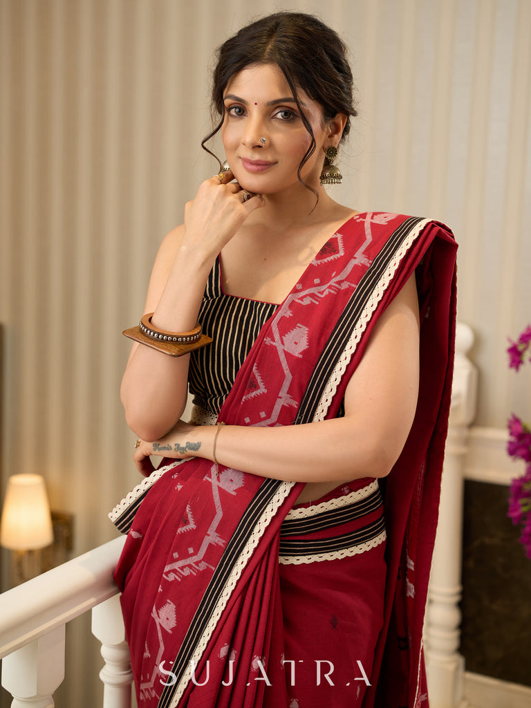Exquisite Jamdani saree in regal red with intricate motifs and lace borders