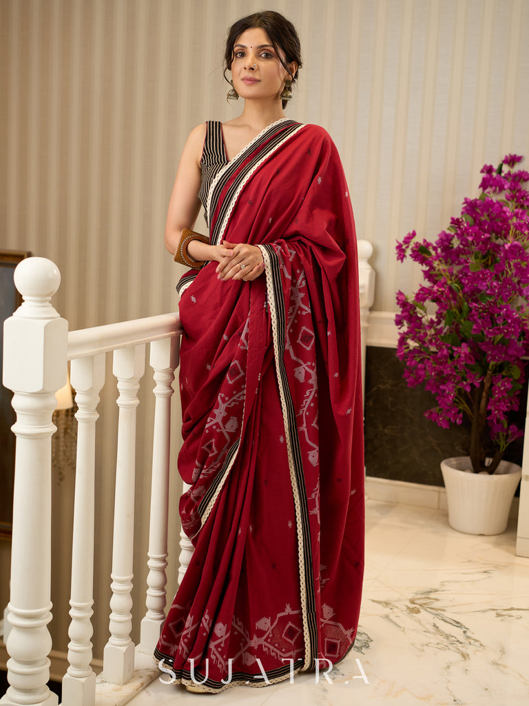 Exquisite Jamdani saree in regal red with intricate motifs and lace borders