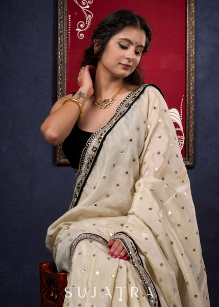 Classy Tissue saree with all-over work Highlighted with Beautiful border