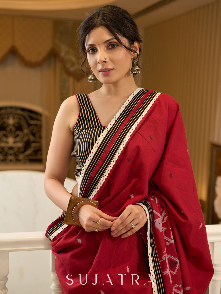 Exquisite Jamdani saree in regal red with intricate motifs and lace borders