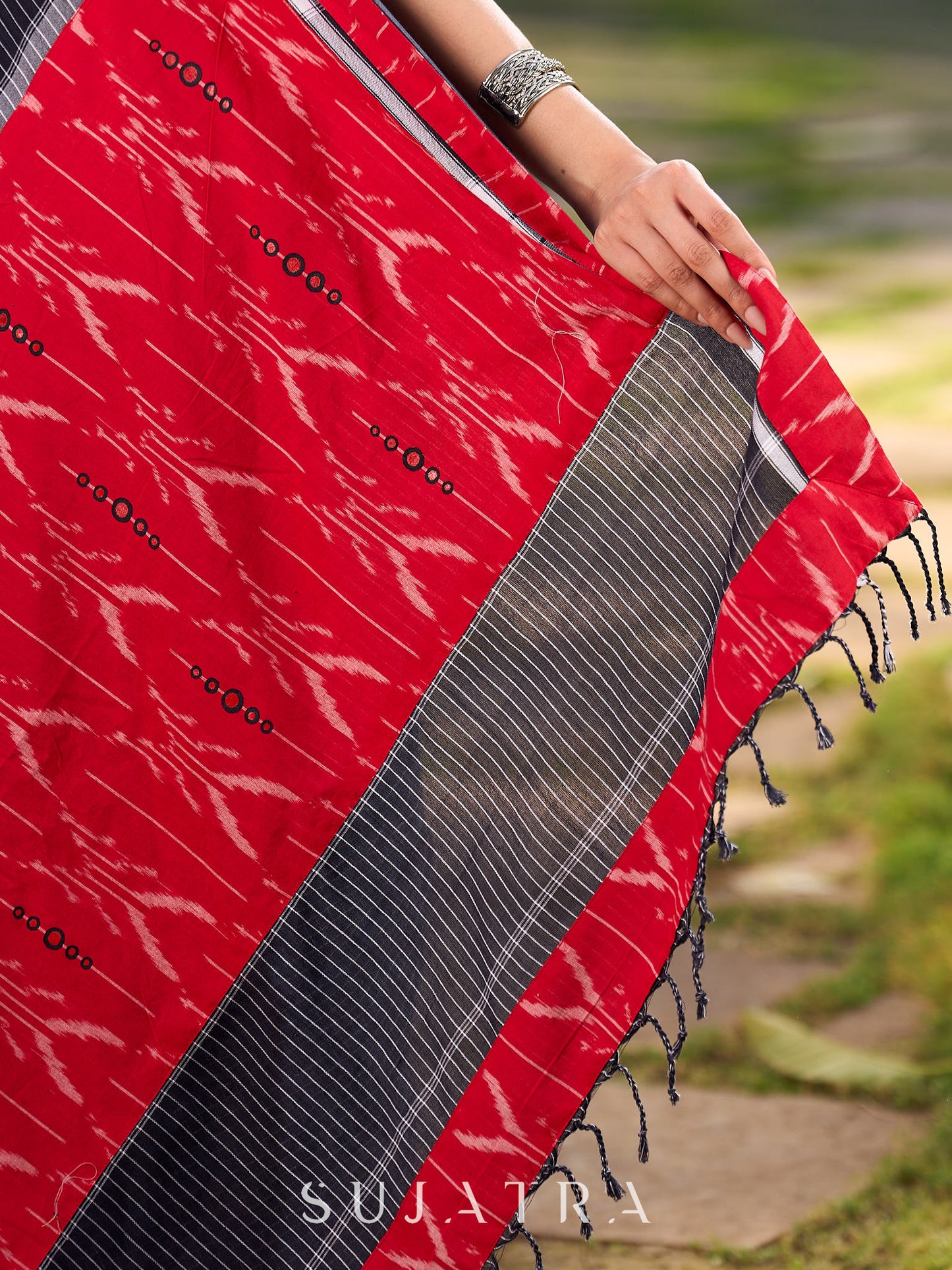 Noir Cotton Checkered Saree with Contrasting Red Ikat Accents