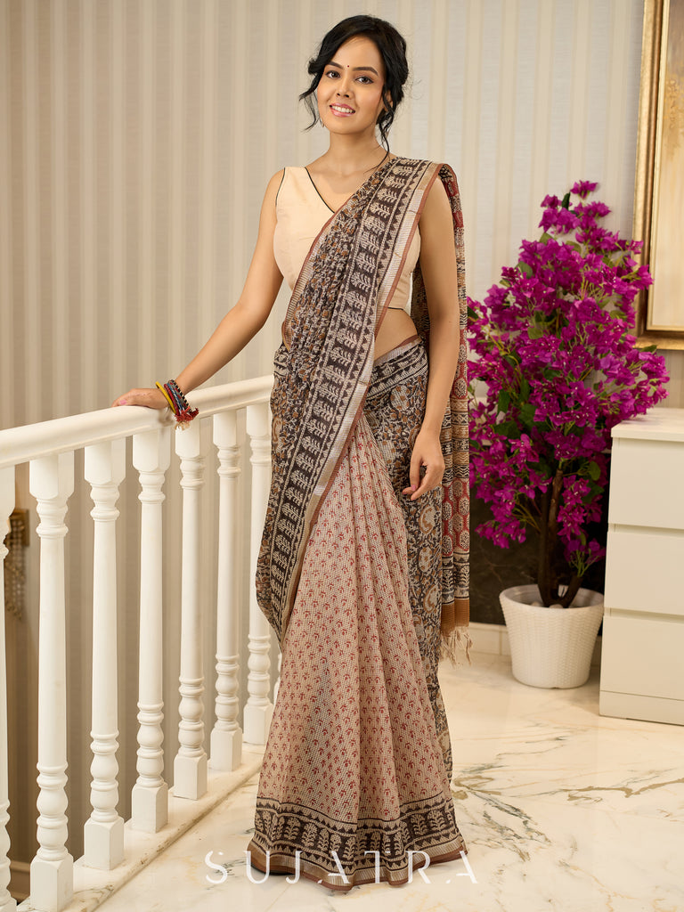 Rustic charm woven in earthy tones—hand block printed kota saree