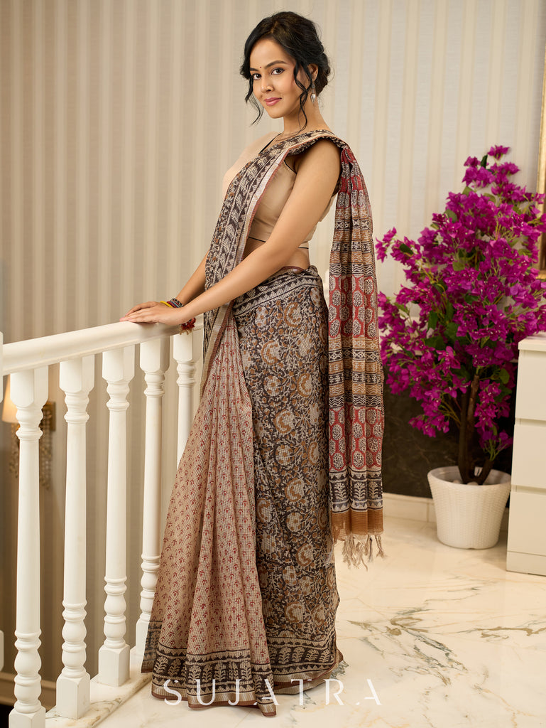 Rustic charm woven in earthy tones—hand block printed kota saree