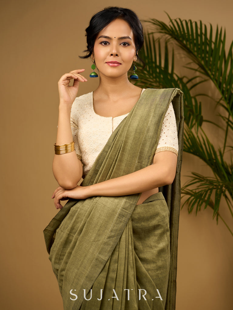 Delicate cotton hakoba blouse with intricate floral patterns.