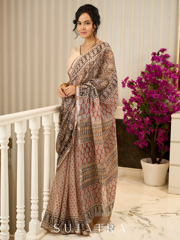 Rustic charm woven in earthy tones—hand block printed kota saree