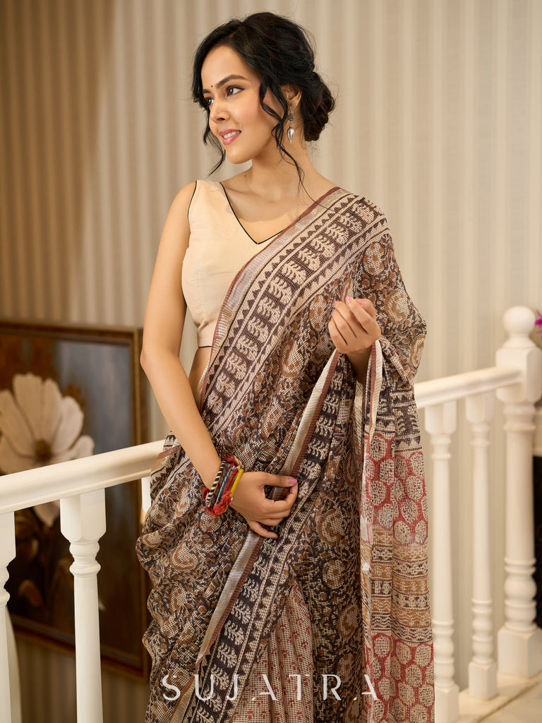 Rustic charm woven in earthy tones—hand block printed kota saree