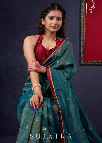 Exclusive Tissue saree with Golden Butta Work All-over Highlighted with Maroon Detailing