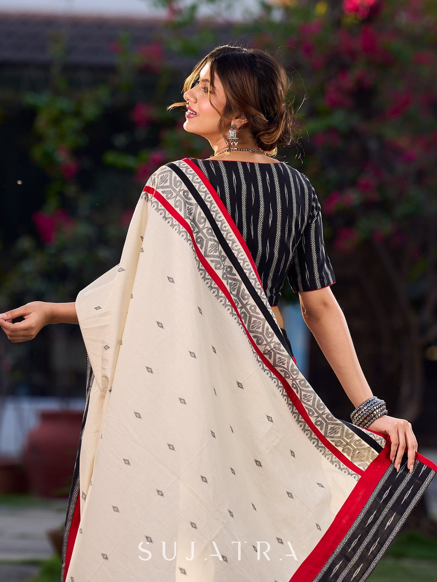 Timeless Black Saree with Ikat & Jamdani Accents