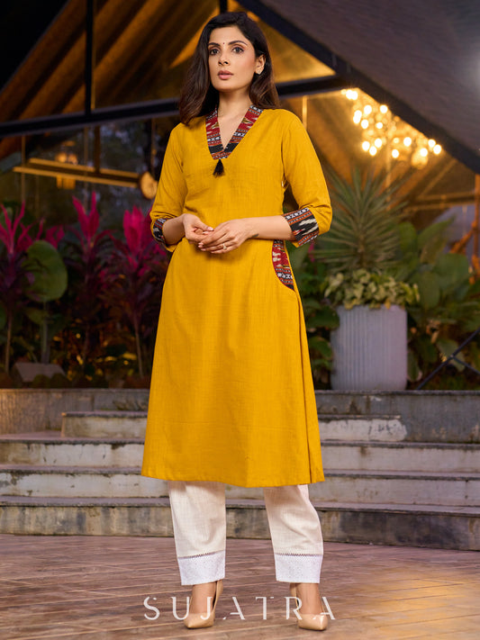 An elegant fusion of cotton comfort and vibrant Ikat charm kurta -white pant optional