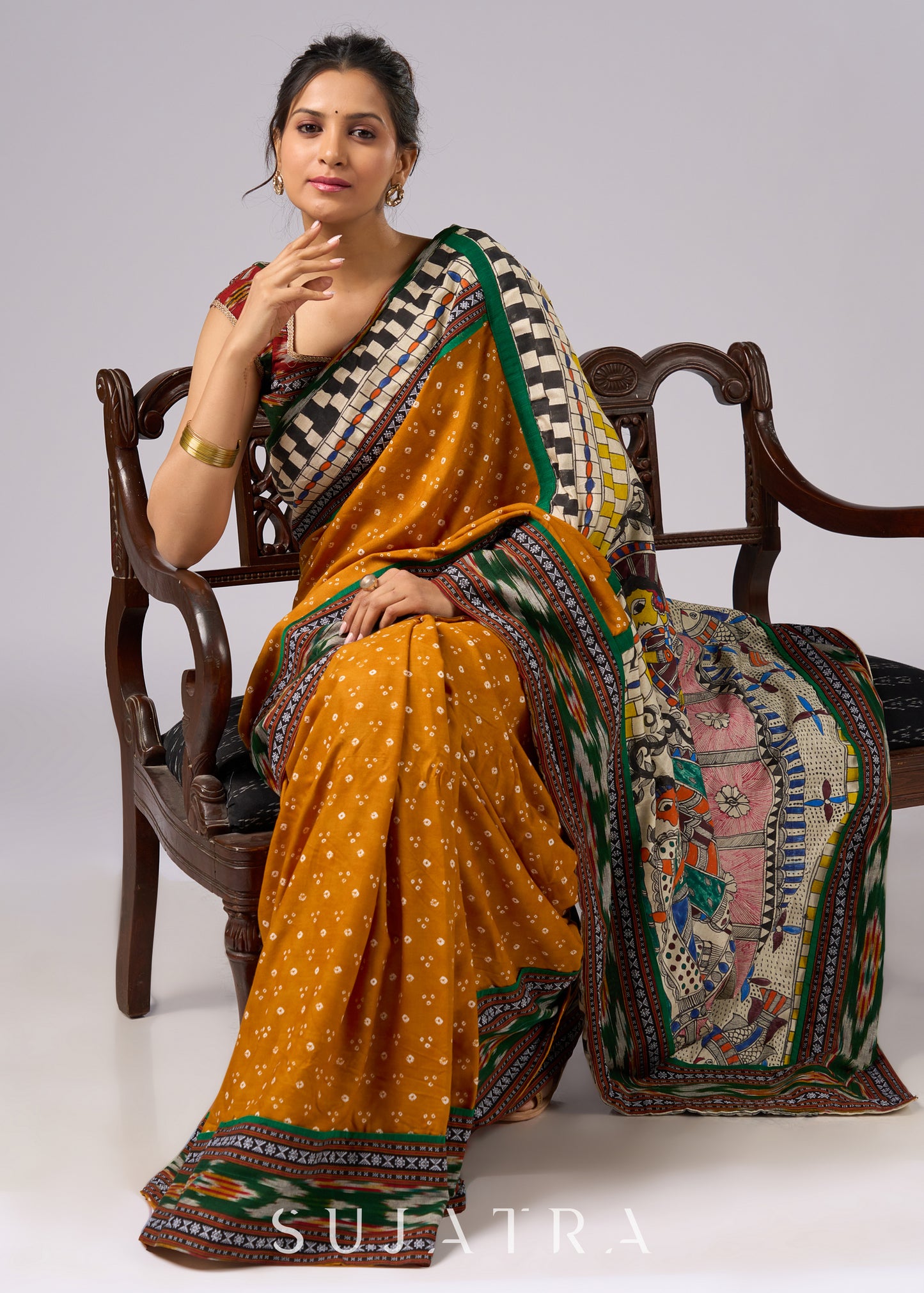 Vibrant yellow Bandhani print rayon saree with hand painted Madhubani art