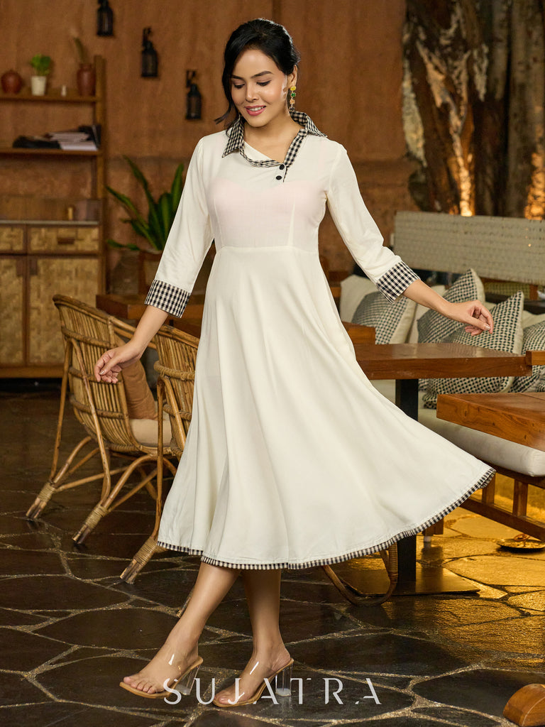 Monochrome Muse Off-White Flowy Dress with Checkered Accents