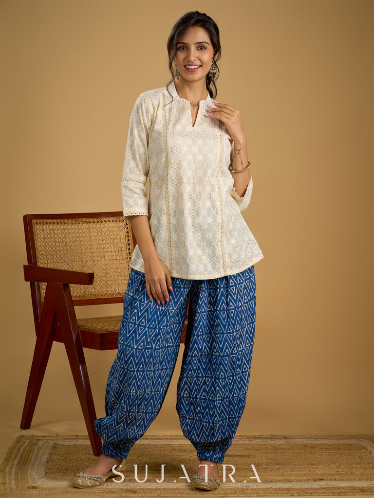 Classic off -white cotton top featuring delicate hakoba embroidery work.