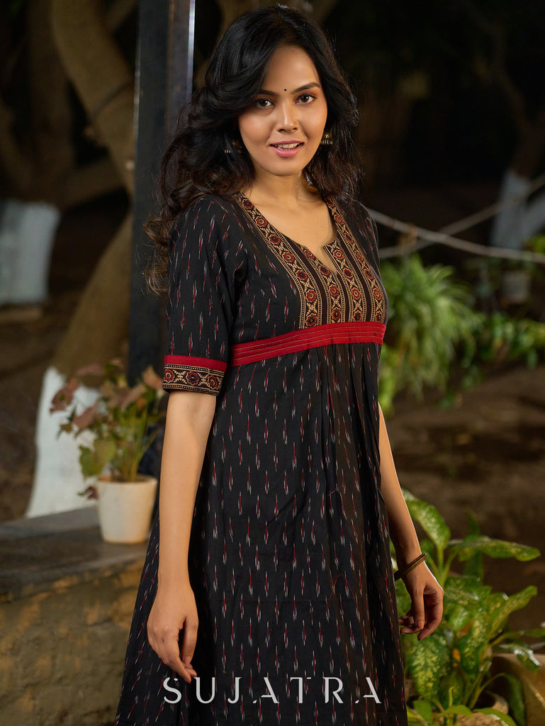 Black Ikat Weave Kurta Featuring Artisan Ajrakh Yoke