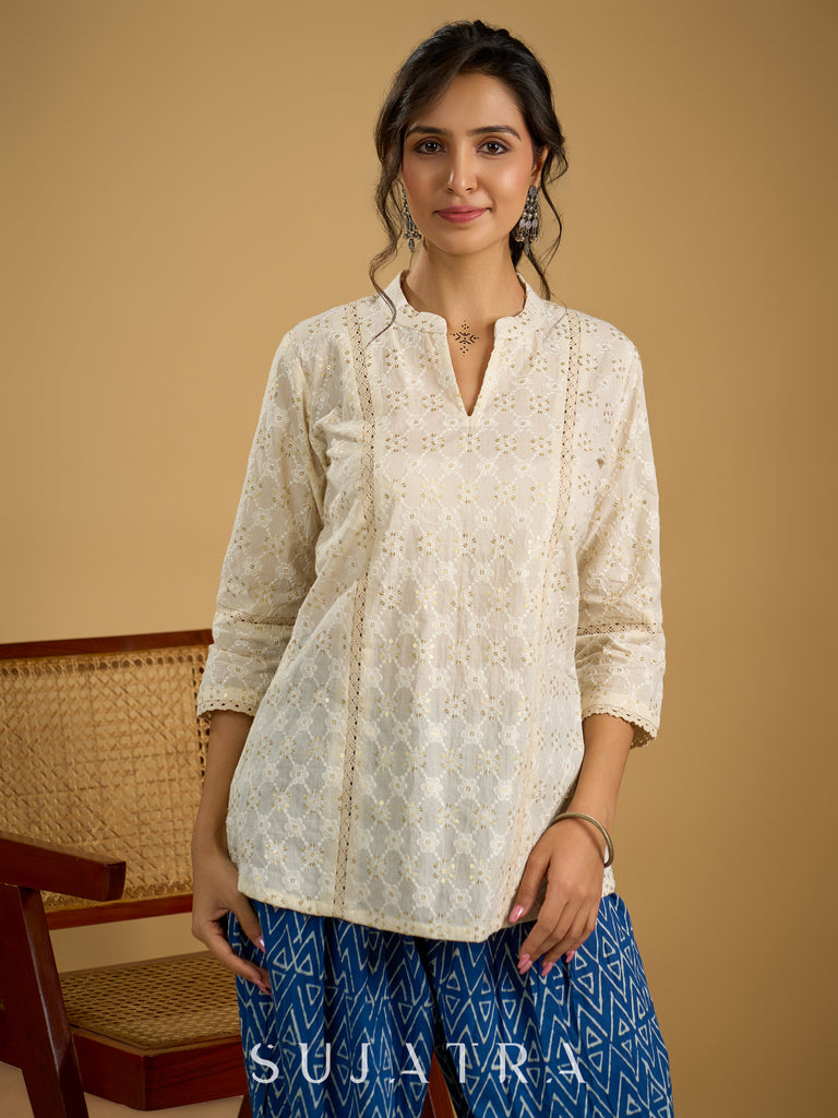 Classic off -white cotton top featuring delicate hakoba embroidery work.