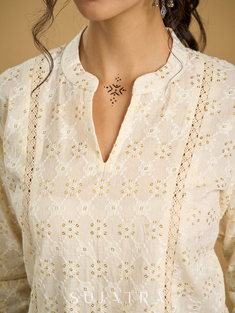 Classic off -white cotton top featuring delicate hakoba embroidery work.