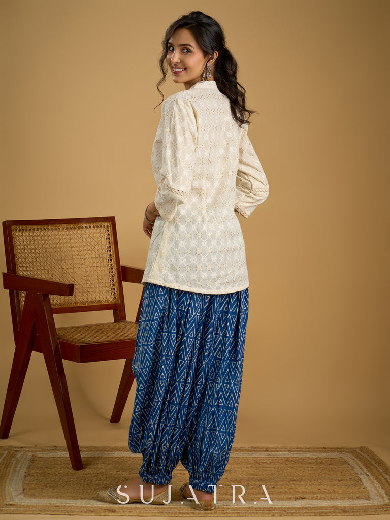 Classic off -white cotton top featuring delicate hakoba embroidery work.