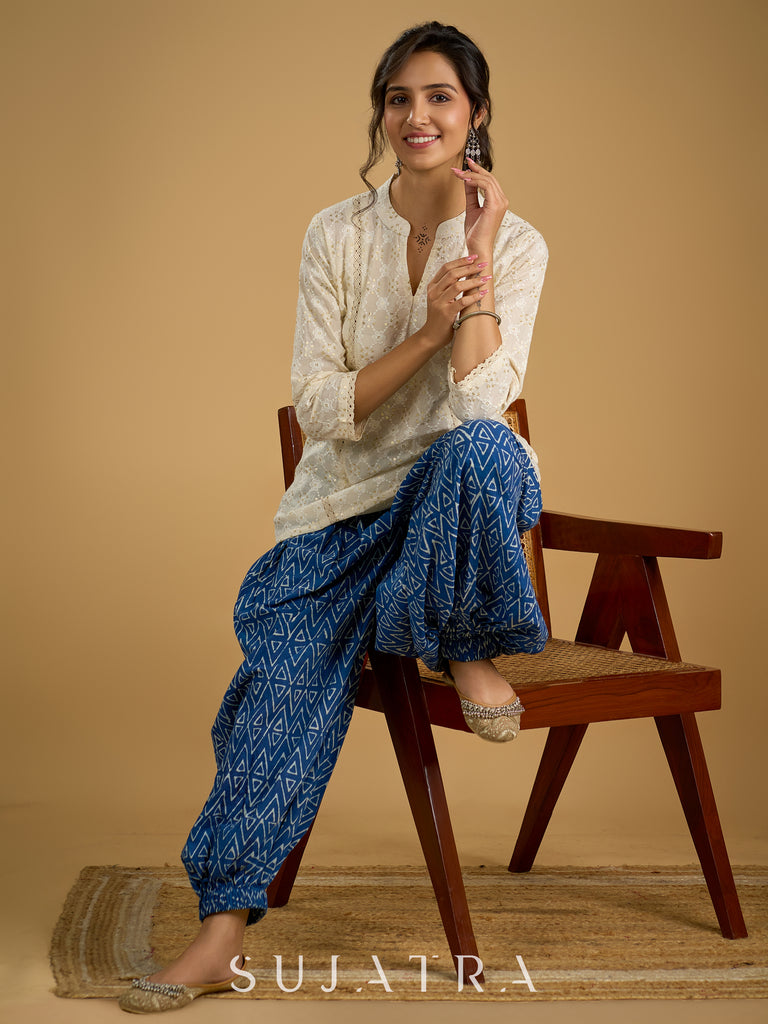 Classic off -white cotton top featuring delicate hakoba embroidery work.