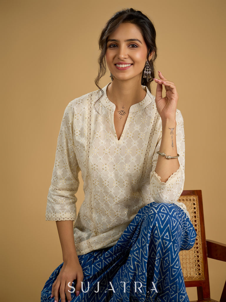 Classic off -white cotton top featuring delicate hakoba embroidery work.