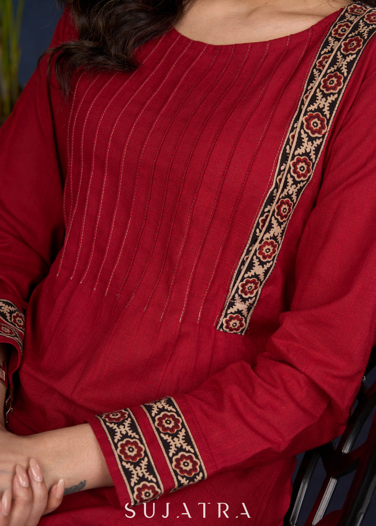 Maroon Cotton Tunic With Stylish Pin Tucks And Vibrant Ajrak Patterns.