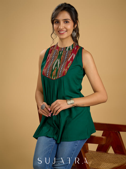 Elegant rayon green sleeveless top with ikat accents.