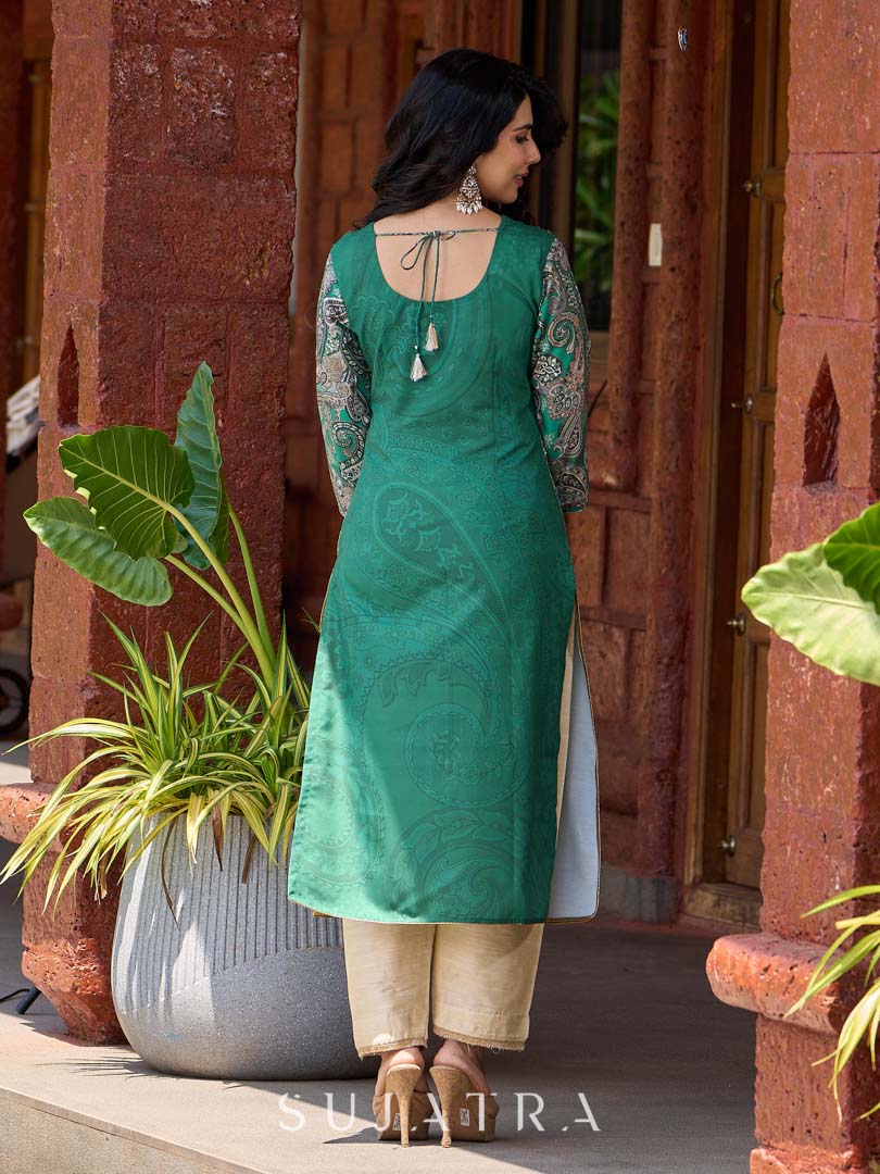 Statement green paisley kurta with detailed hand embroidery beautifully enhancing the print.