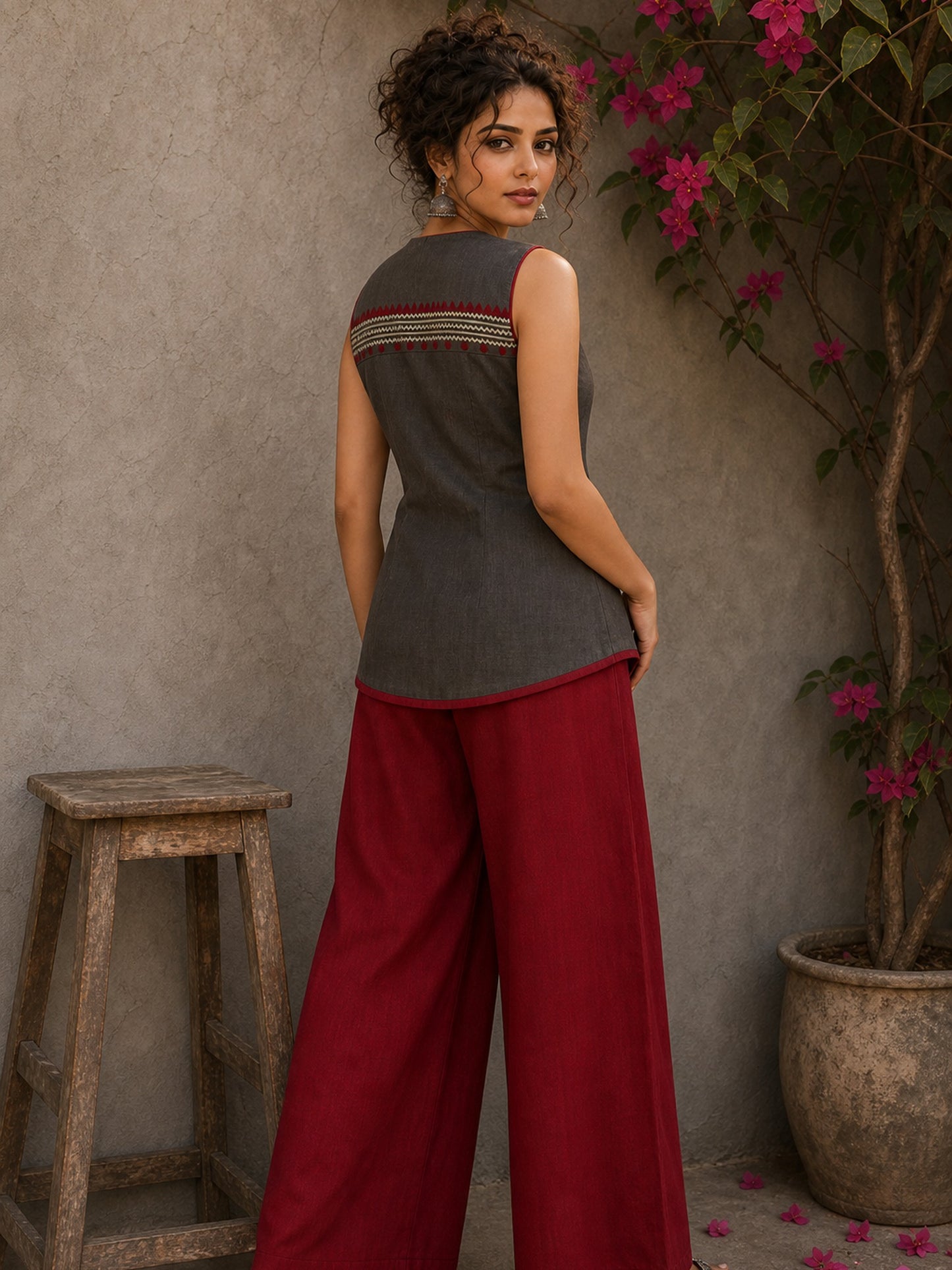 Distinctive Grey and maroon hand block print top featuring bold striped motifs, an asymmetric overlap silhouette, and artisanal detailing, bringing contemporary charm to effortless everyday dressing.