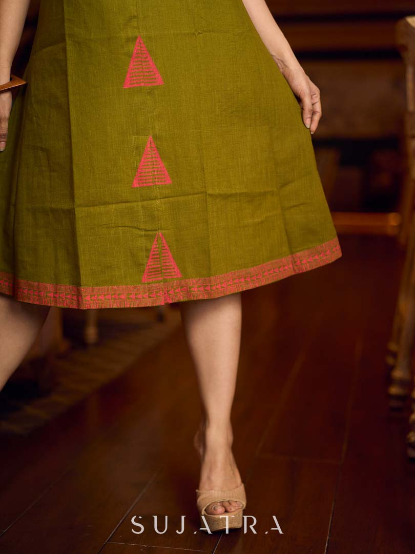 Gorgeous olive dress with pink abstract triangle hand block prints placed at the centre, sleeves, and back, featuring a mandarin collar and half sleeves for a refined, contemporary look.