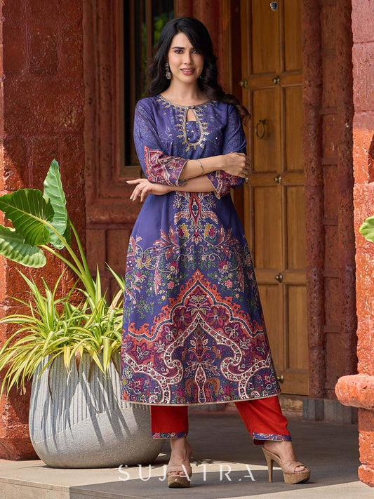 Stunning royal blue printed kurta adorned with handcrafted zardozi and sequin detailing on the keyhole neck.