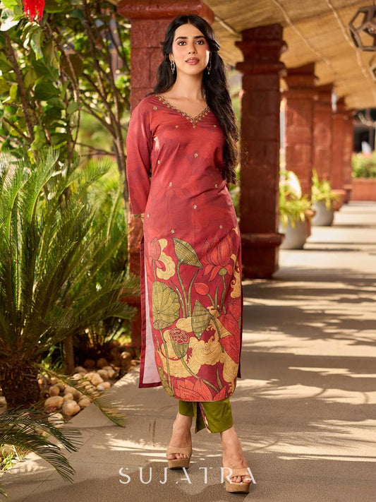 Classic deep rustic maroon kurta with detailed hand embroidery, statement olive and cream Pichwai artwork, and rich gold highlights