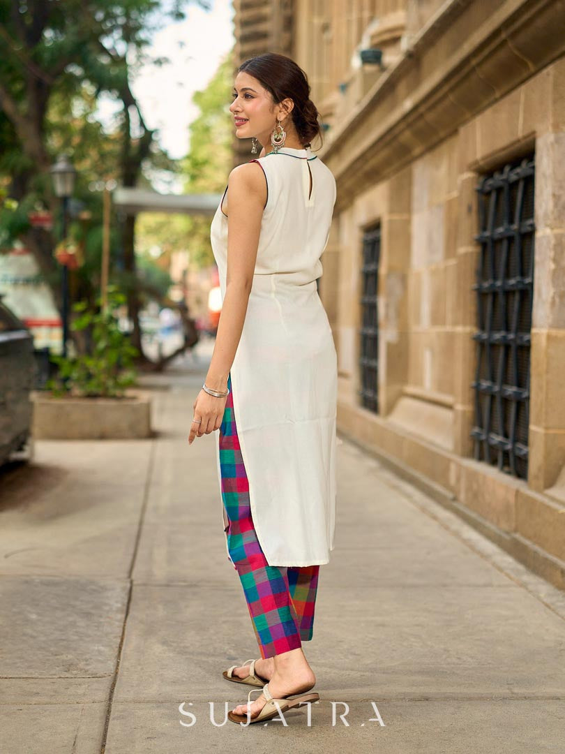 Pristine Off-White Sleeveless Halter Neck Kurta with Vibrant Multicolor Buttons & Hem Trim