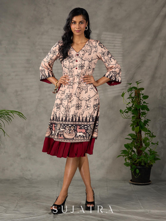 Beige traditional printed dress with rich maroon accents.