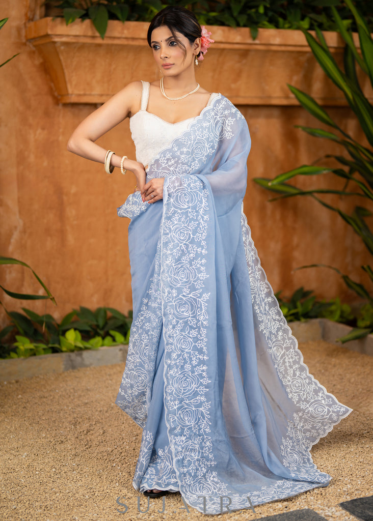 Elegant Powder Blue Organza Saree Highlighted With Overall Intricate Floral Embroidery