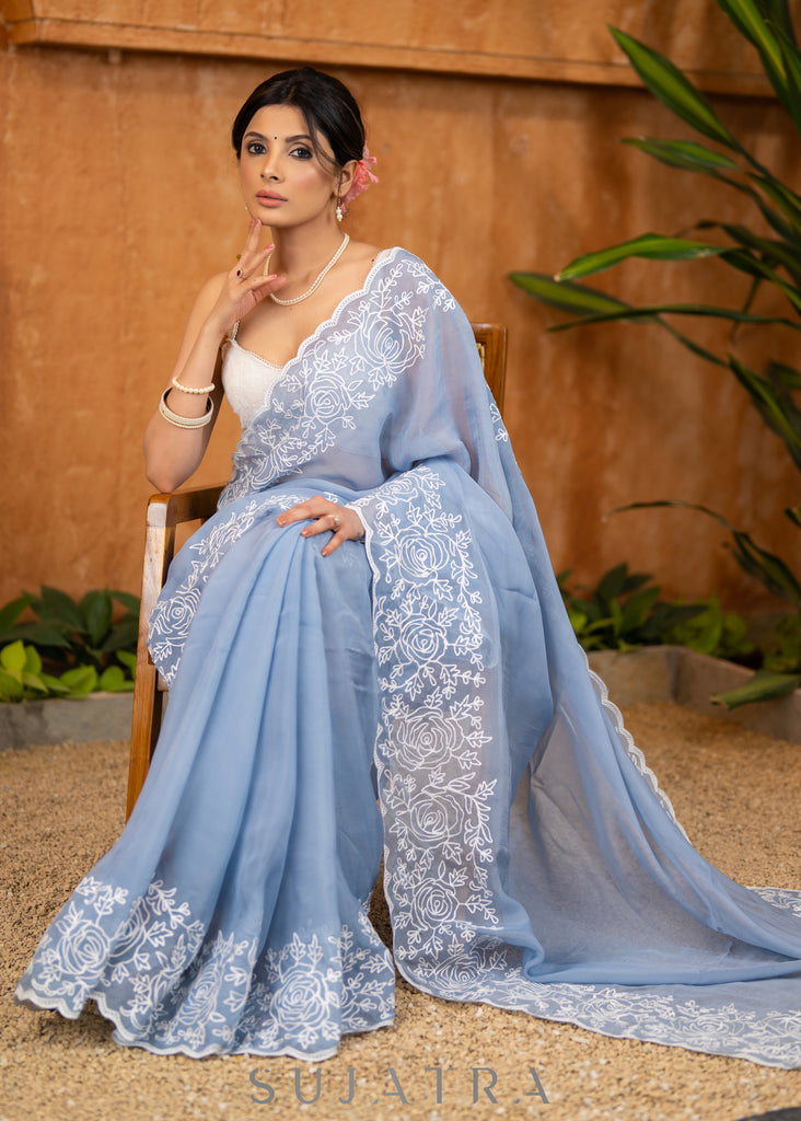 Elegant Powder Blue Organza Saree Highlighted With Overall Intricate Floral Embroidery