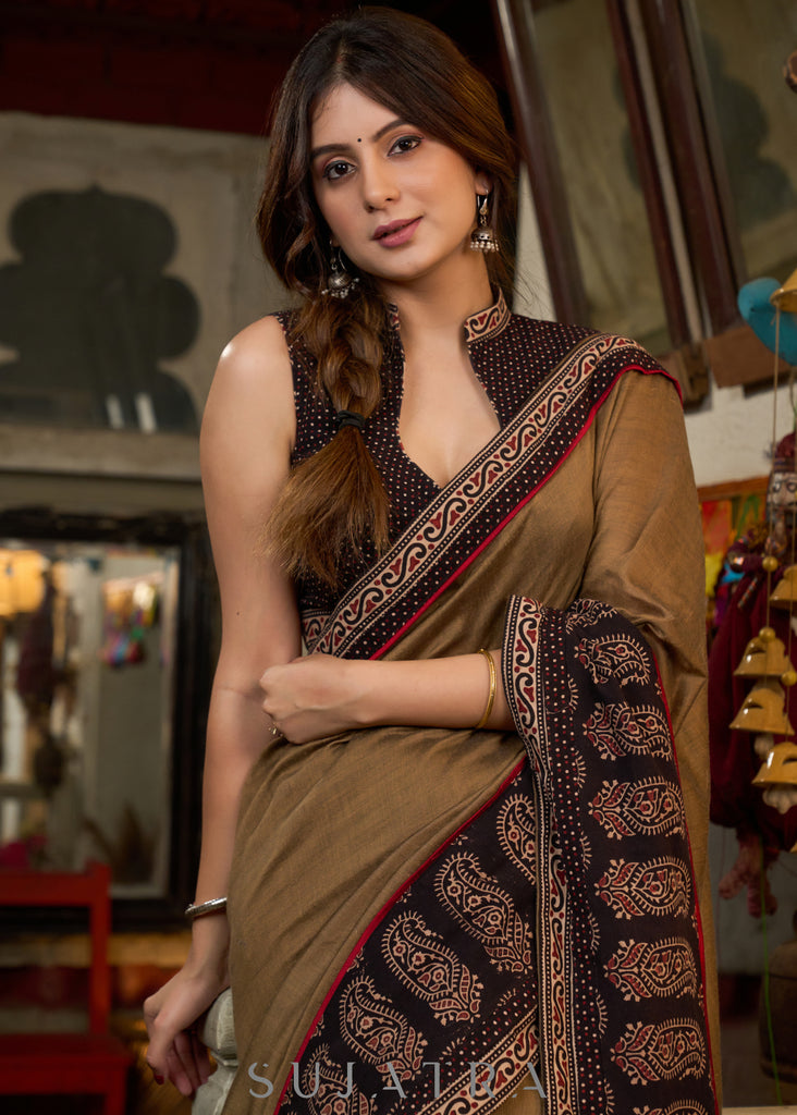 Gracious coffee brown cotton saree with ajrakh combination highlighted with side pocket