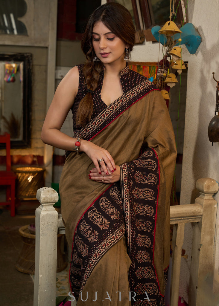 Gracious coffee brown cotton saree with ajrakh combination highlighted with side pocket