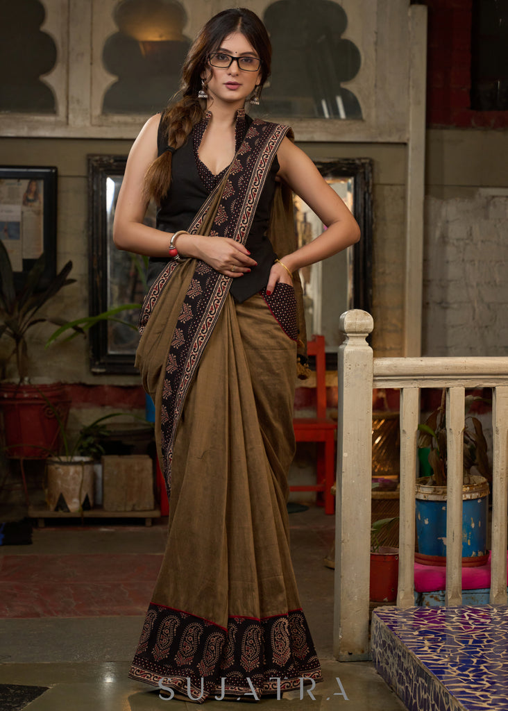 Gracious coffee brown cotton saree with ajrakh combination highlighted with side pocket