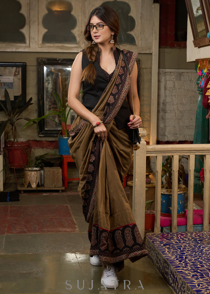 Gracious coffee brown cotton saree with ajrakh combination highlighted with side pocket