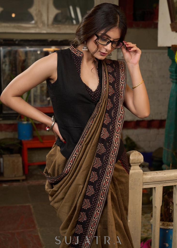 Gracious coffee brown cotton saree with ajrakh combination highlighted with side pocket