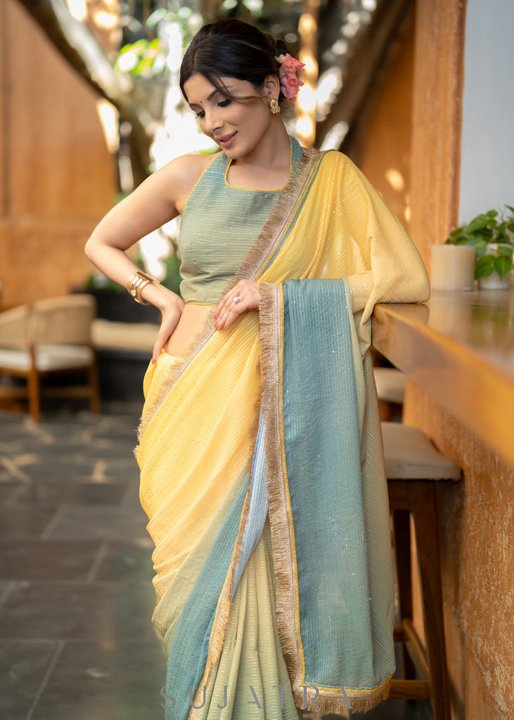 Graceful Yellowish Green Ombre Georgette Saree With Overall Sequenced Crochet Highlighted With Elegant Laces