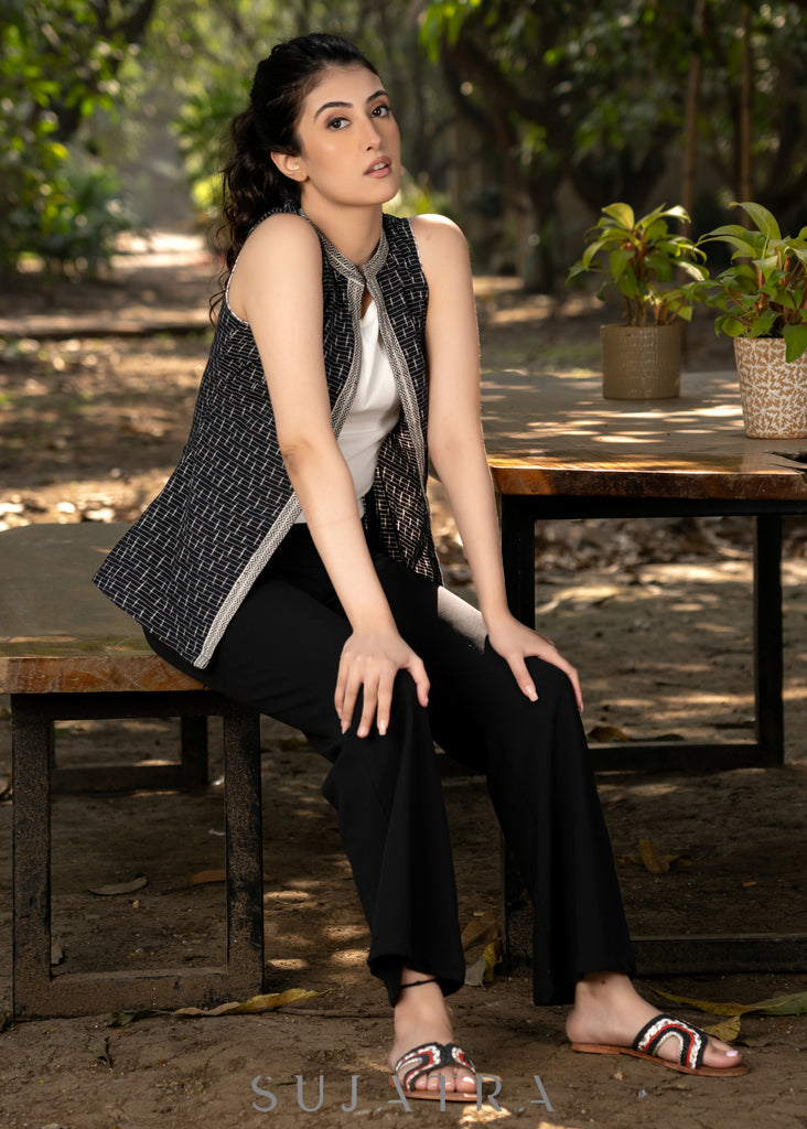 Elegant black cotton ikat sleeveless jacket with mandarin collar