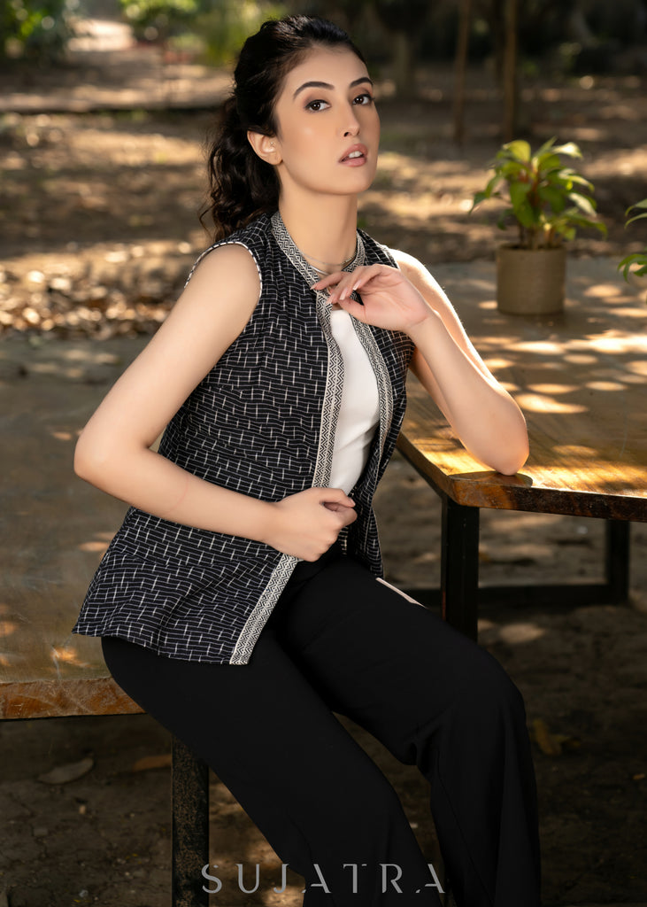 Elegant black cotton ikat sleeveless jacket with mandarin collar